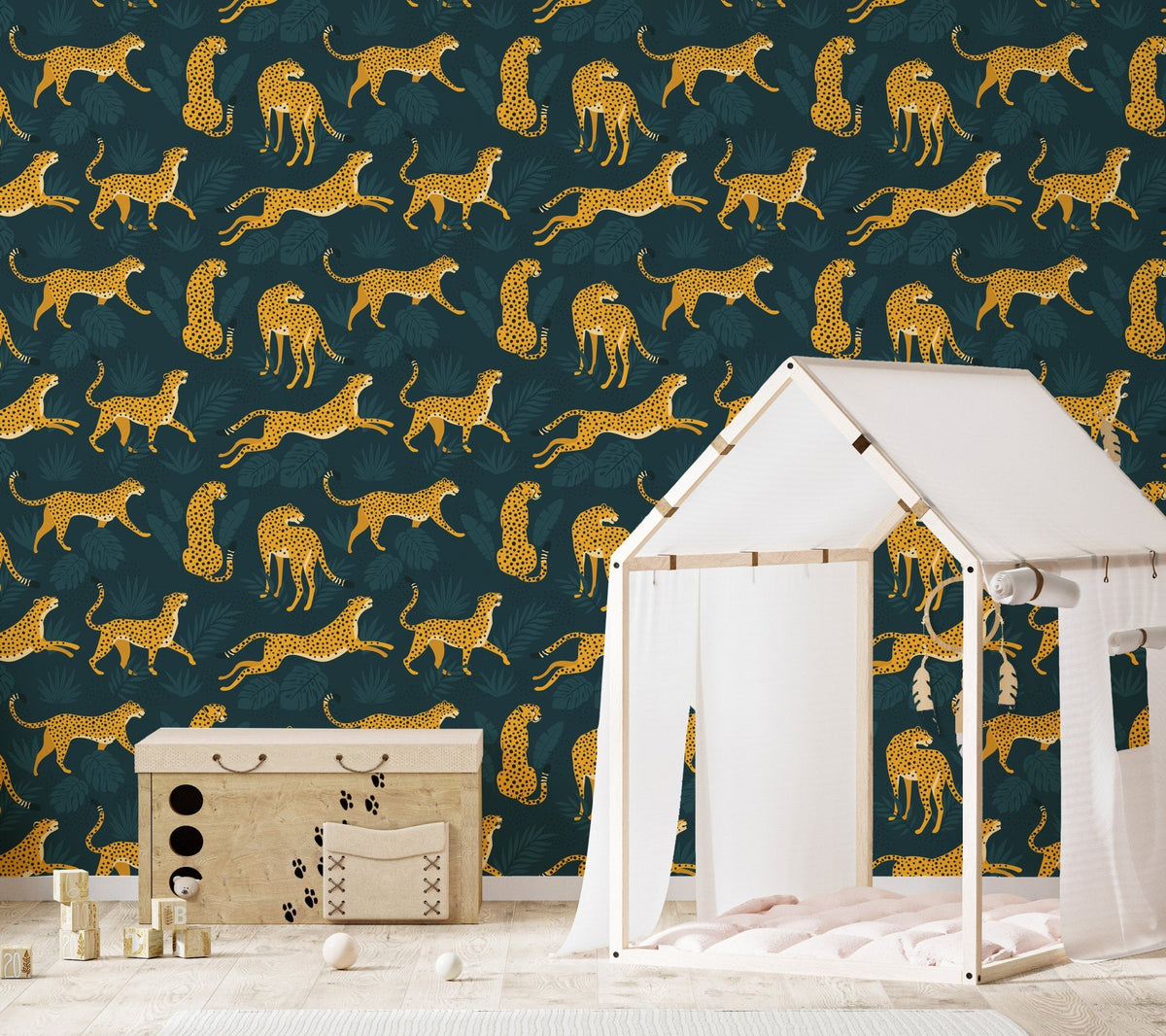 Repeated Yellow Leopard Pattern Wallpaper on a nursery wall with a white play tent.