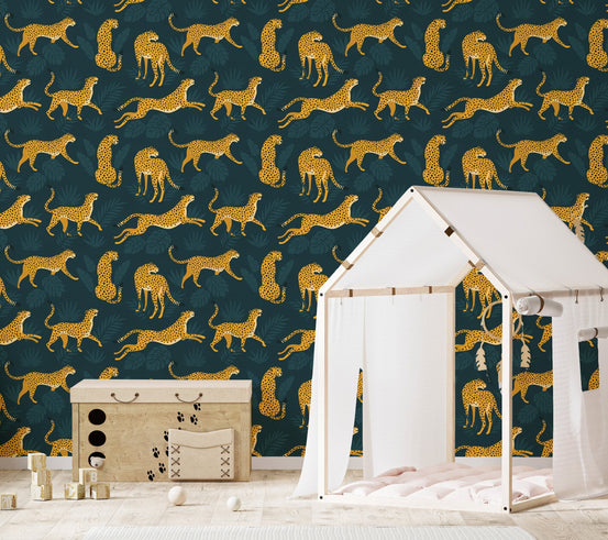 Repeated Yellow Leopard Pattern Wallpaper on a nursery wall with a white play tent.
