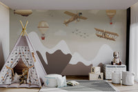Scenic mountain landscape mural with hot air balloons in kids playroom.