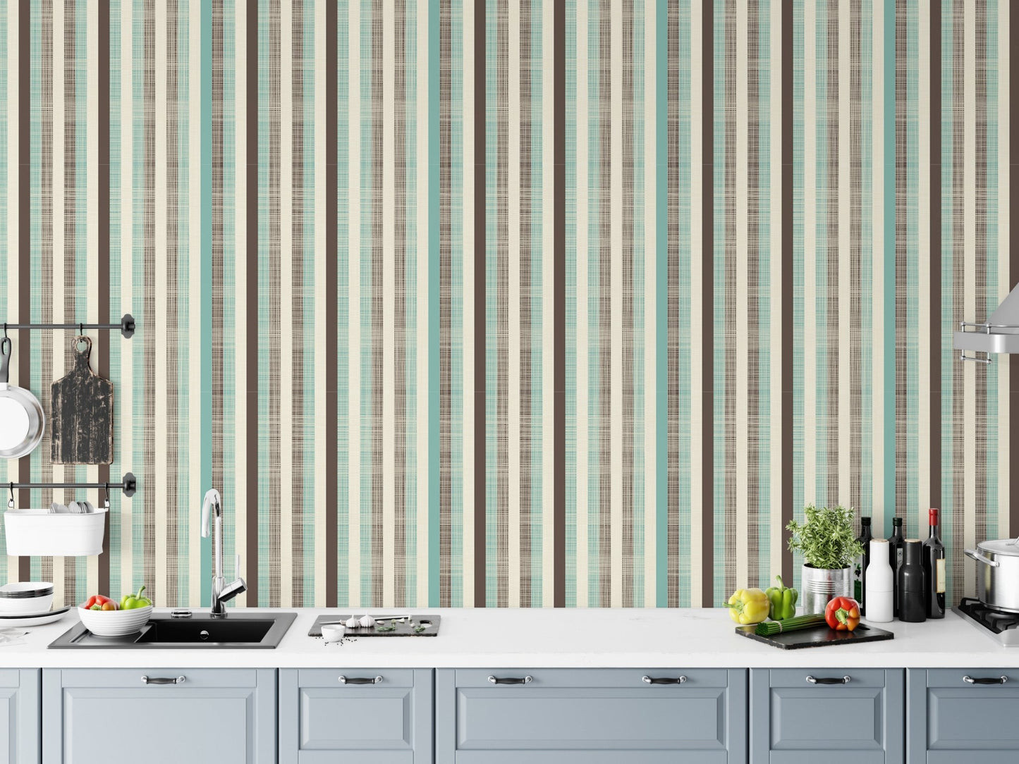 Kitchen backsplash area featuring water-resistant green and brown striped wallpaper.