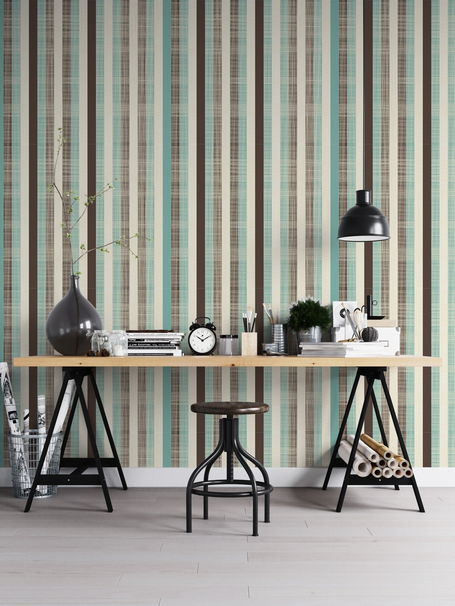 Home office setup with vertical stripe wallpaper and industrial metal desk.