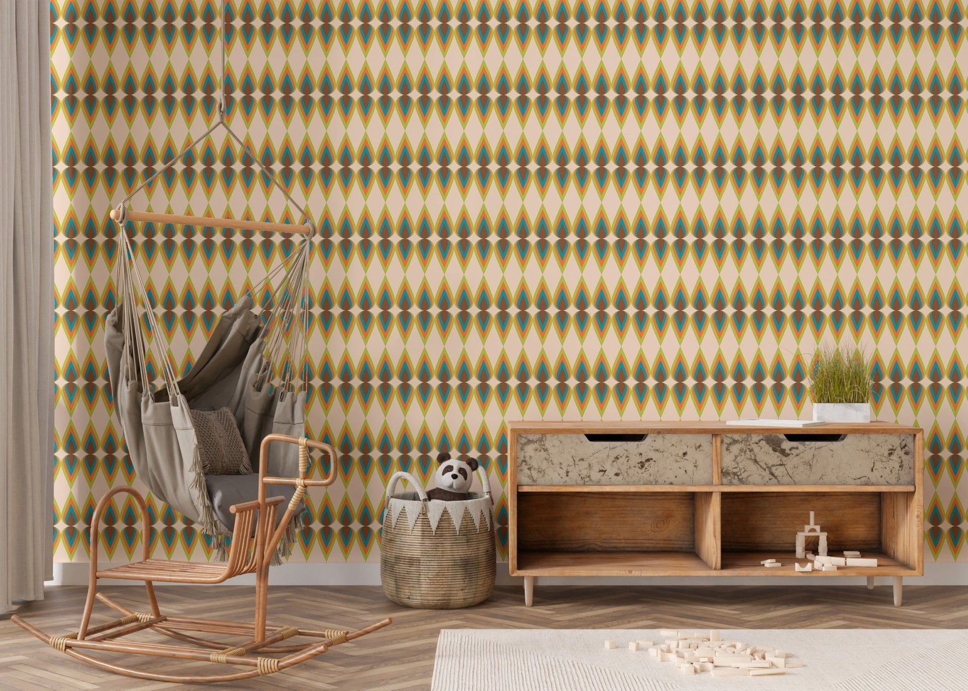 Modern rocking chair placed against a striped wall mural in a nursery area.