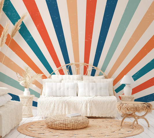 Retro sunburst geometric wallpaper with orange and teal radiating rays.