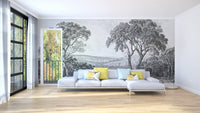 Monochrome river wall mural behind a white sofa in a modern living room.