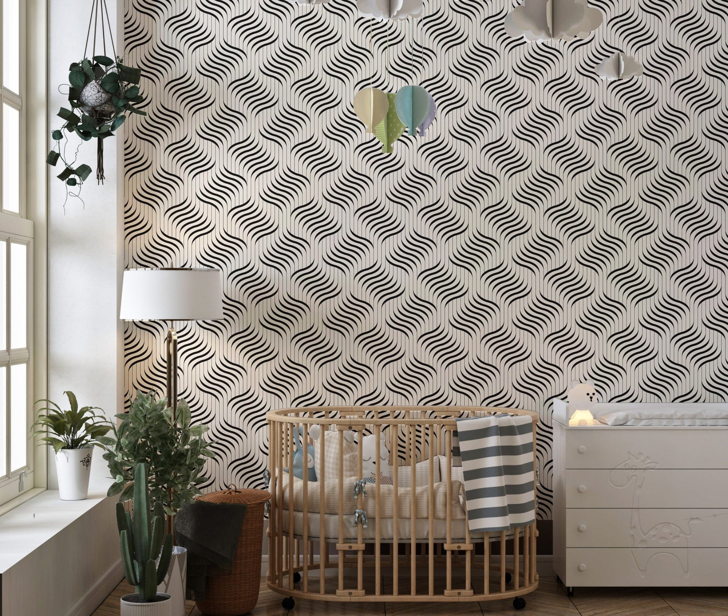 Ripple Monochrome Geometric Waves Wallpaper in a nursery with a wooden crib.