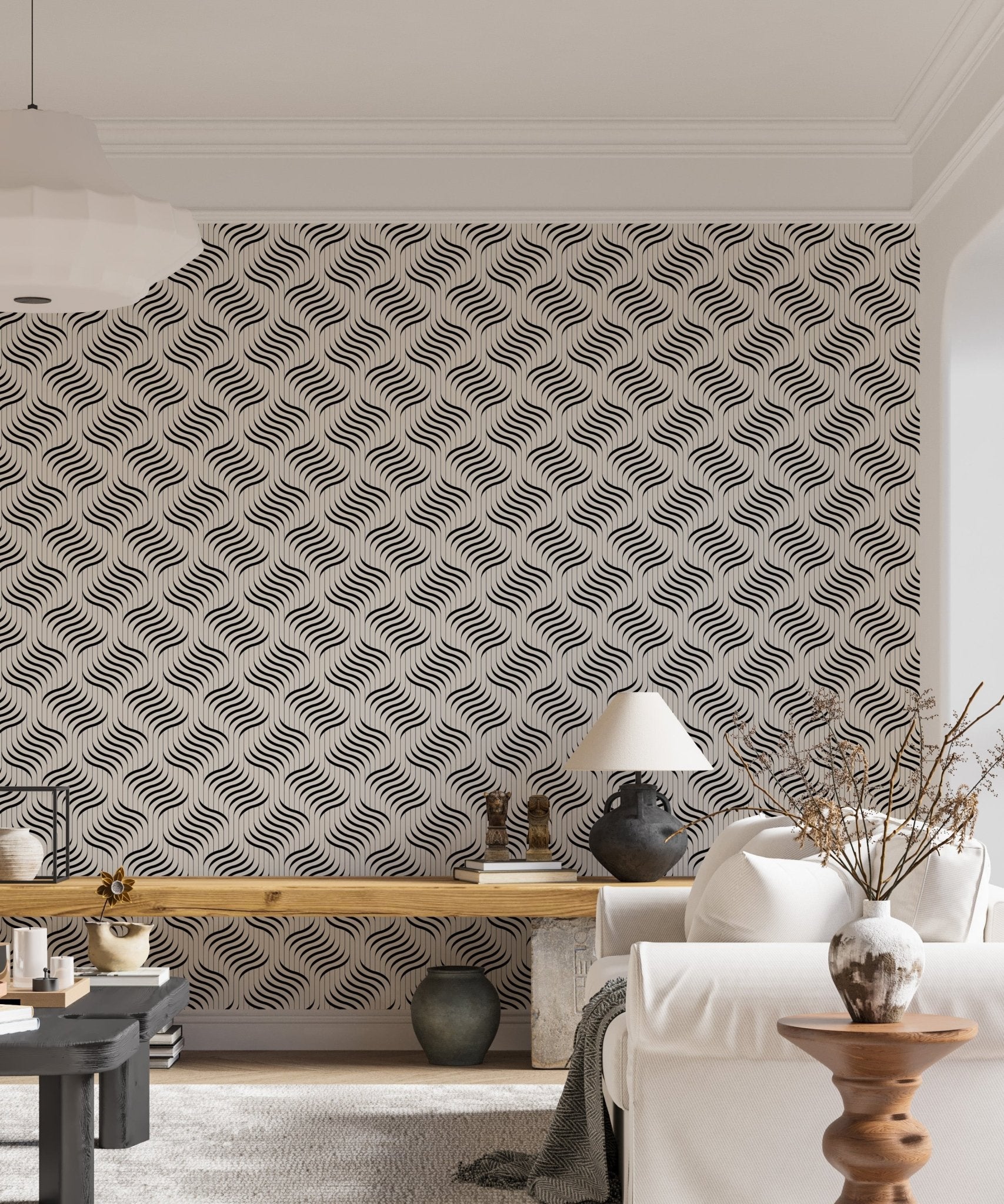 Geometric wavy wallpaper in a living area with a lamp and side table.