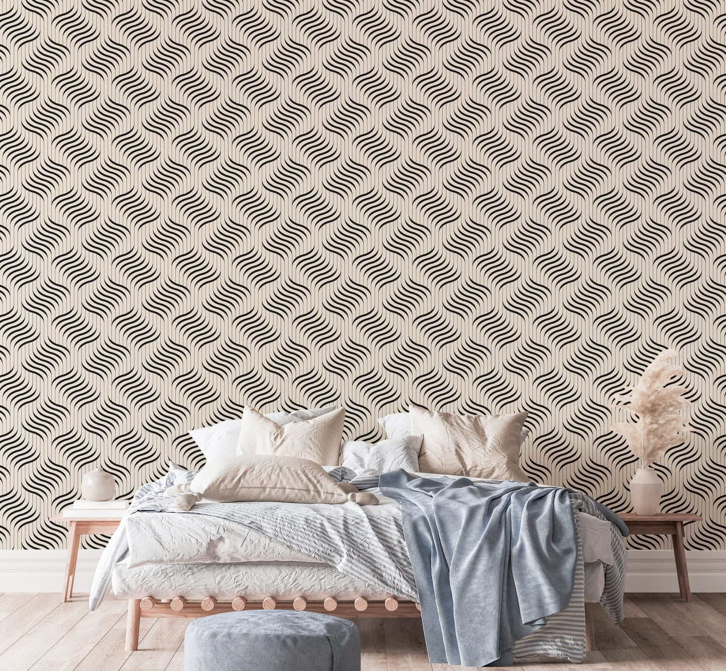 Grey and white wavy pattern wallpaper behind a living room sofa.