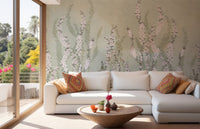 Rising White Orchids with Green Background Murals behind a white sectional sofa.
