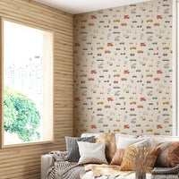 Cute vehicle pattern on cream wallpaper.