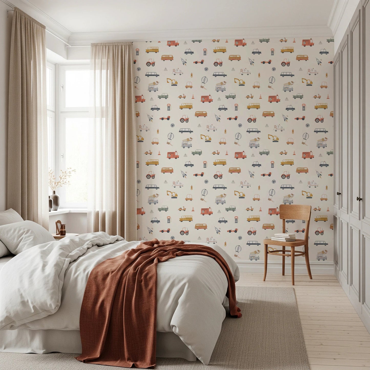 Hand-drawn fire truck and bus wall decor.