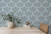 Rococo Silver Texture Pattern Floral Ornaments Wallpaper on a dining room wall.