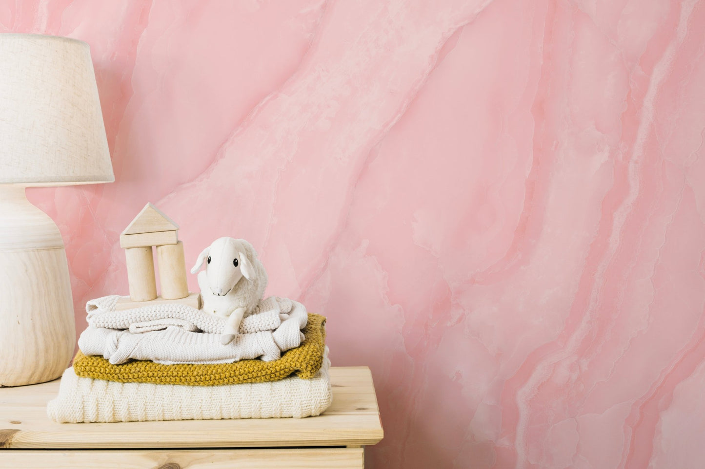 Soft pink marble wall mural for stylish and serene spaces.
