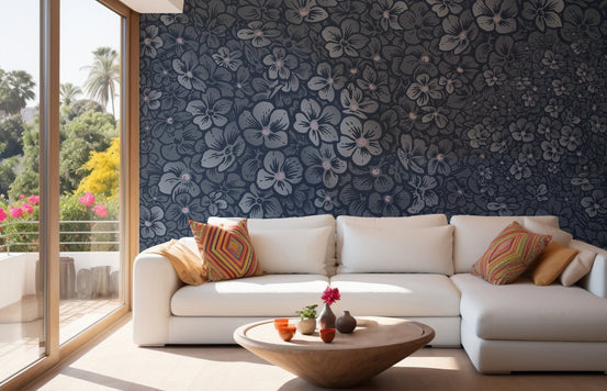 Large floral wall mural behind a white sectional sofa in a bright living room.