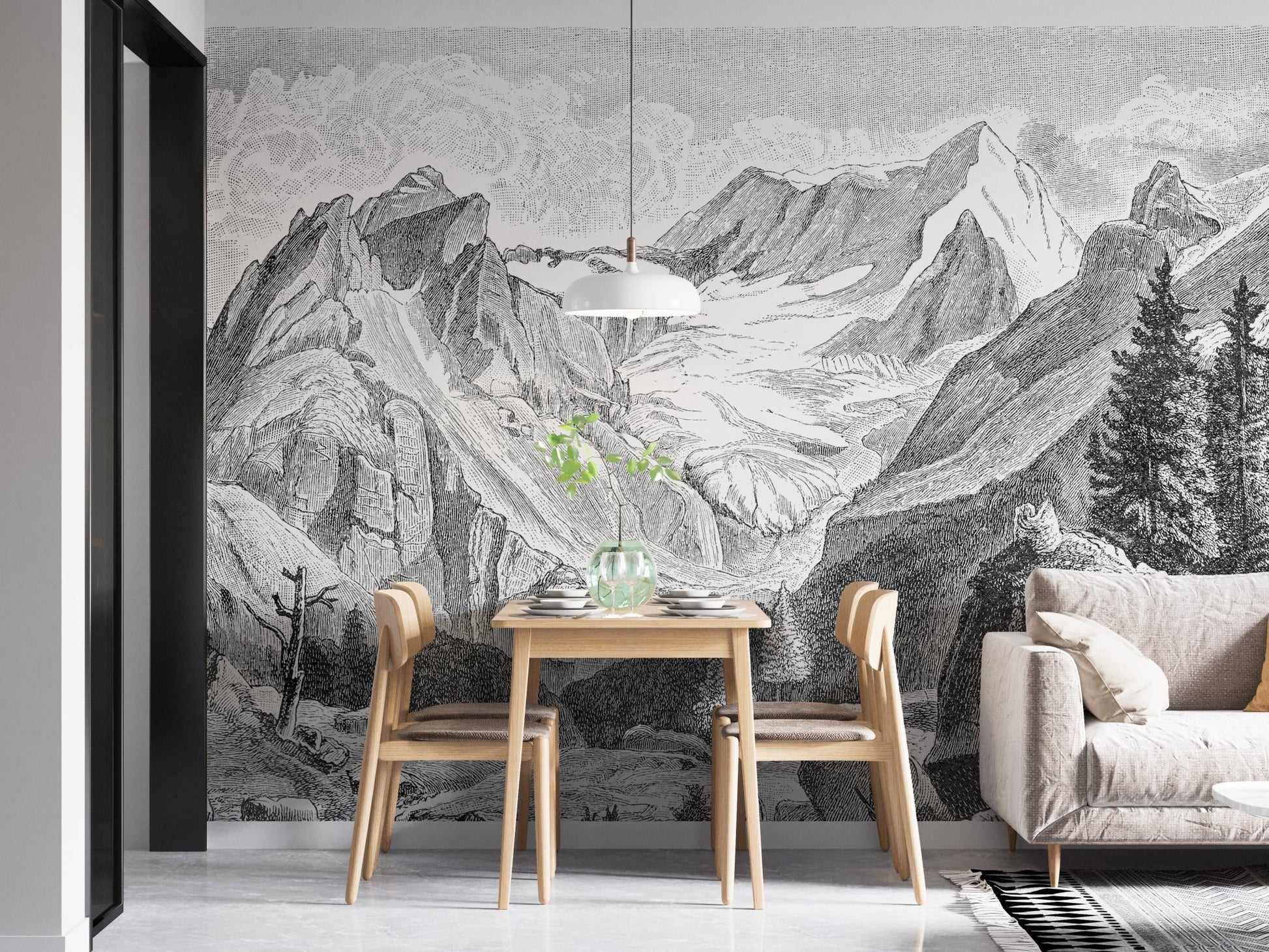 Mountain range wall mural installed in a minimal dining area with grey flooring.