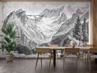 Grey mountain landscape wall mural behind a light wood dining table and chairs.