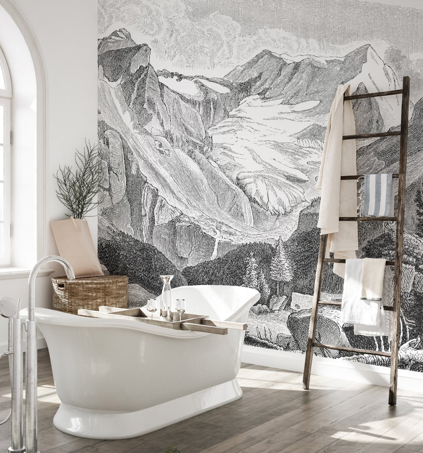 Grey and white mountain wall mural in a luxury bathroom with glass partitions.