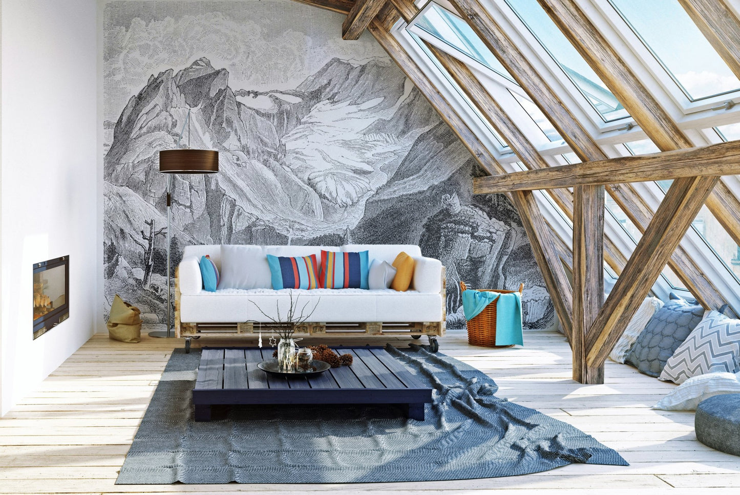 Monochrome alpine mountain wall mural in a spacious living room with a blue rug.