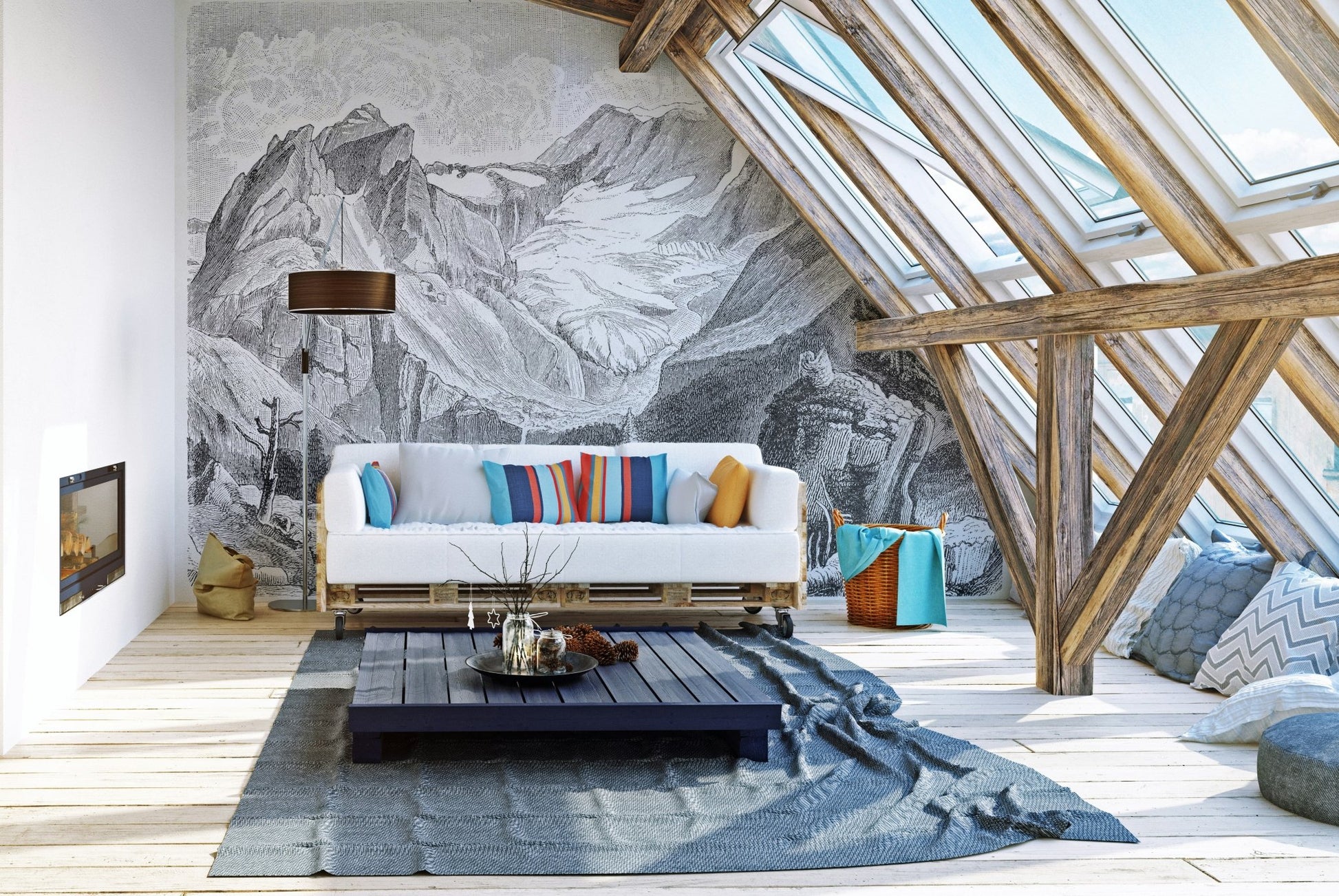 Monochrome alpine mountain wall mural in a spacious living room with a blue rug.