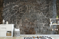 Grunge script mural wallpaper in muted earthy color palette.