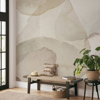 Abstract sand petal mural with layered textures in neutral tones for hallway.