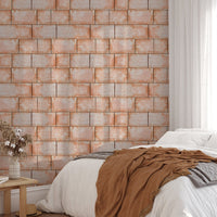 Bedroom wallpaper with sandstone texture and white bedding.