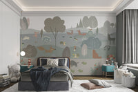 Scandinavian-inspired wall mural with woodland creatures in kids bedroom.