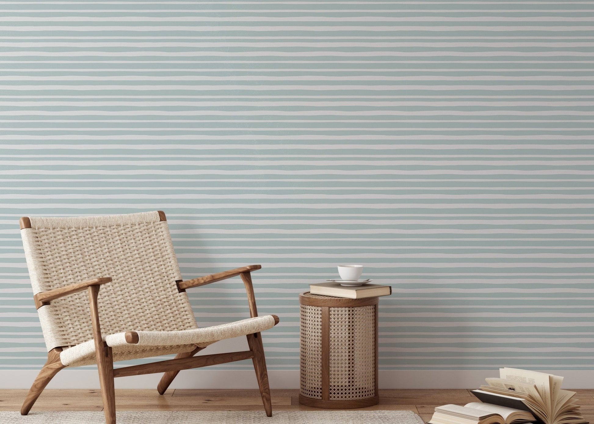 Modern living area with a wooden chair and sea green striped wallpaper.
