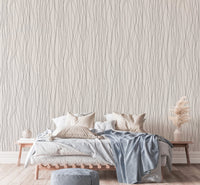 Modern bedroom setting with an abstract linear stripe wallpaper.