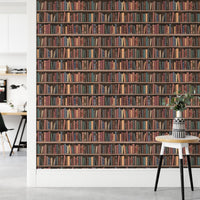 Library wall mural with dark wood shelves and antique book graphics in a modern hallway.
