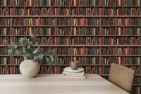 Realistic library shelf wall mural with multi-colored book spines for a home office.