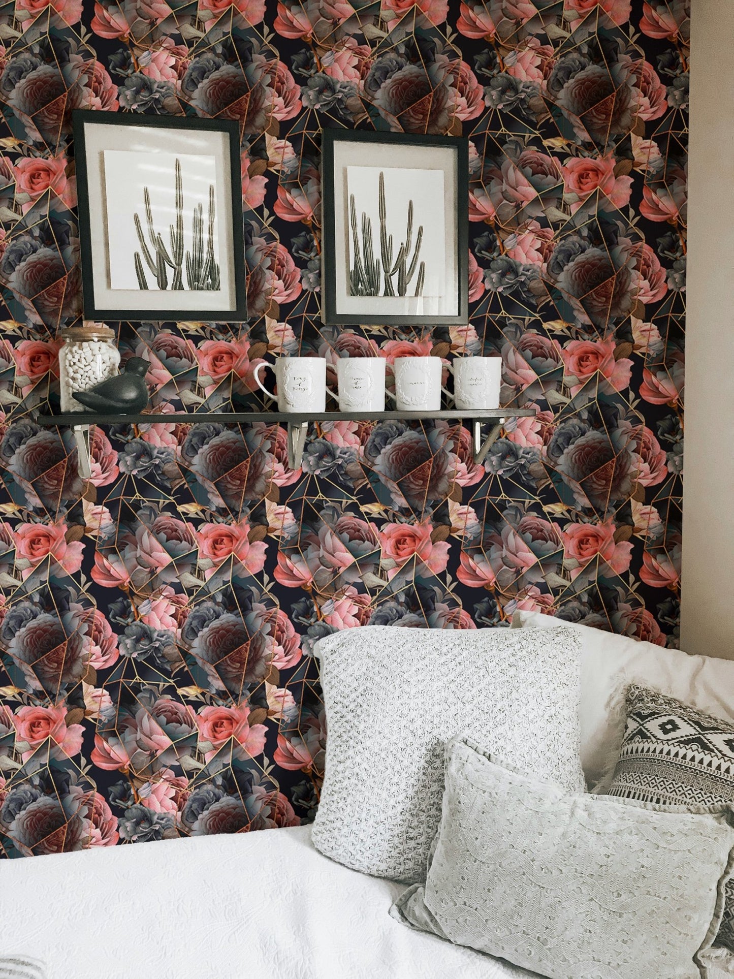 Floral wallpaper with gold lines in a living room with white sofa and framed art