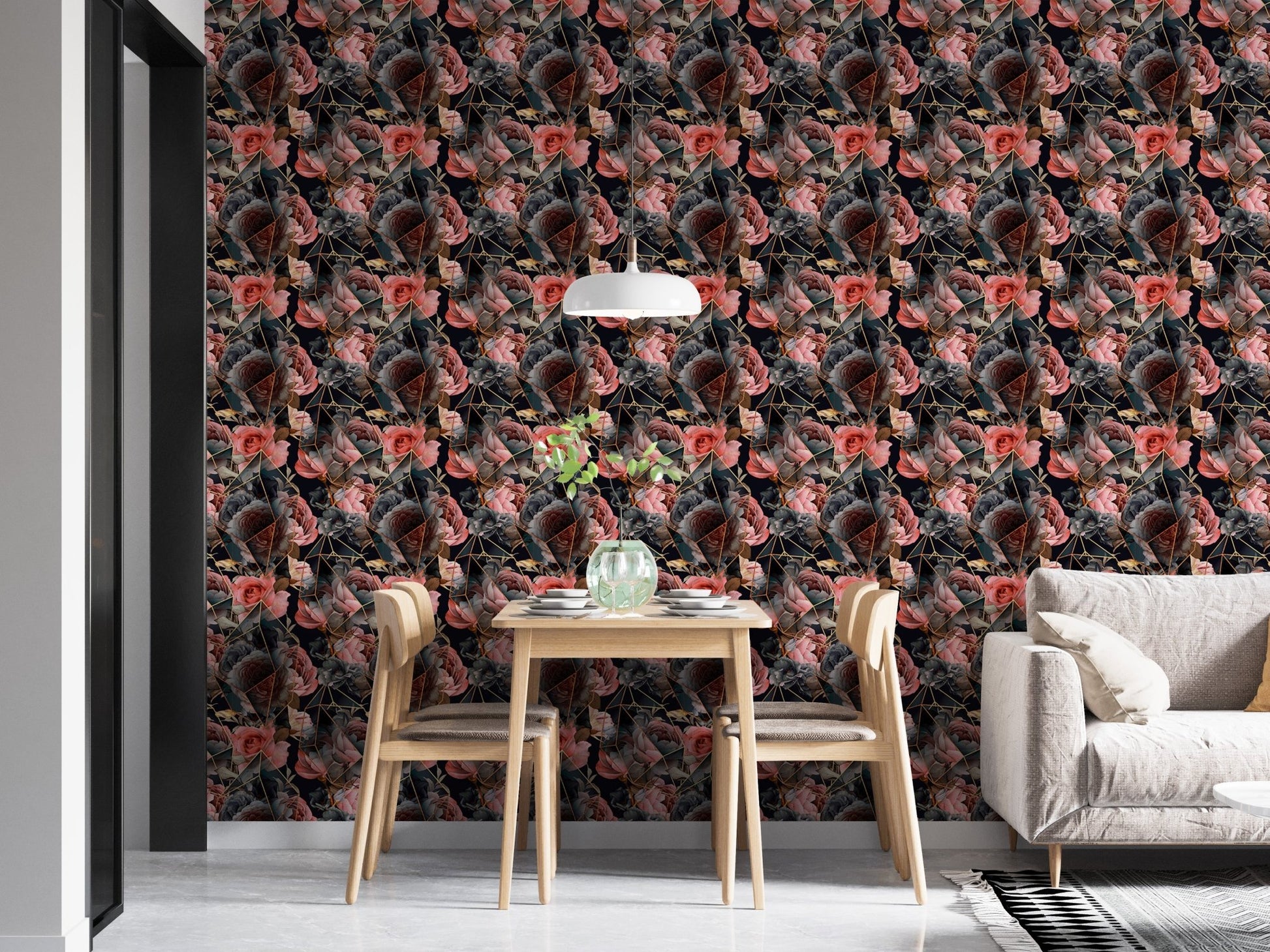 Floral wallpaper behind a dining set with modern chairs and a white sofa