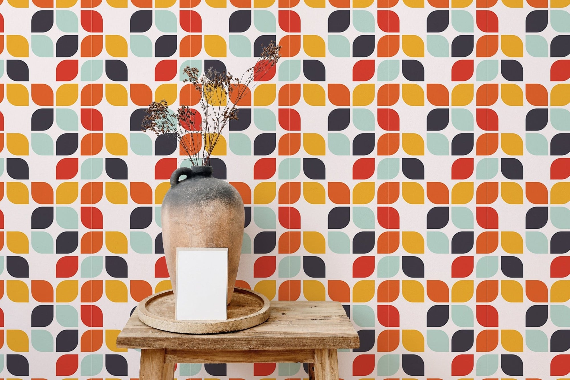 Seamless Geometric Vintage Tile Design Wall mural behind a wooden stool with a ceramic vase.