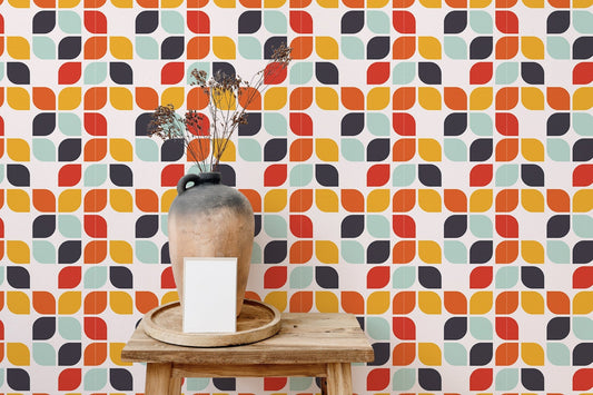 Seamless Geometric Vintage Tile Design Wall mural behind a wooden stool with a ceramic vase.
