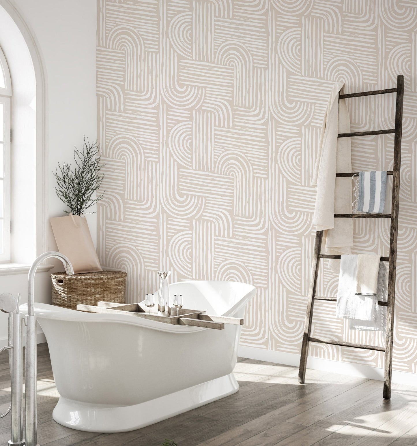 Bathroom wallpaper featuring line art patterns behind a white freestanding tub.