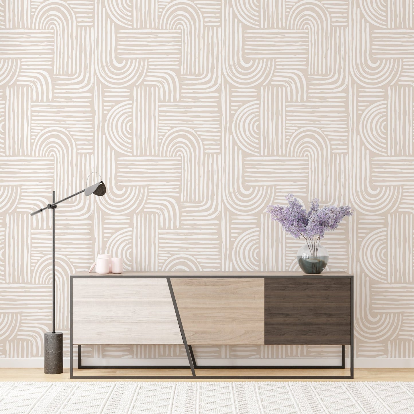 Sideboard area wallpaper with neutral geometric lines and a floor lamp.