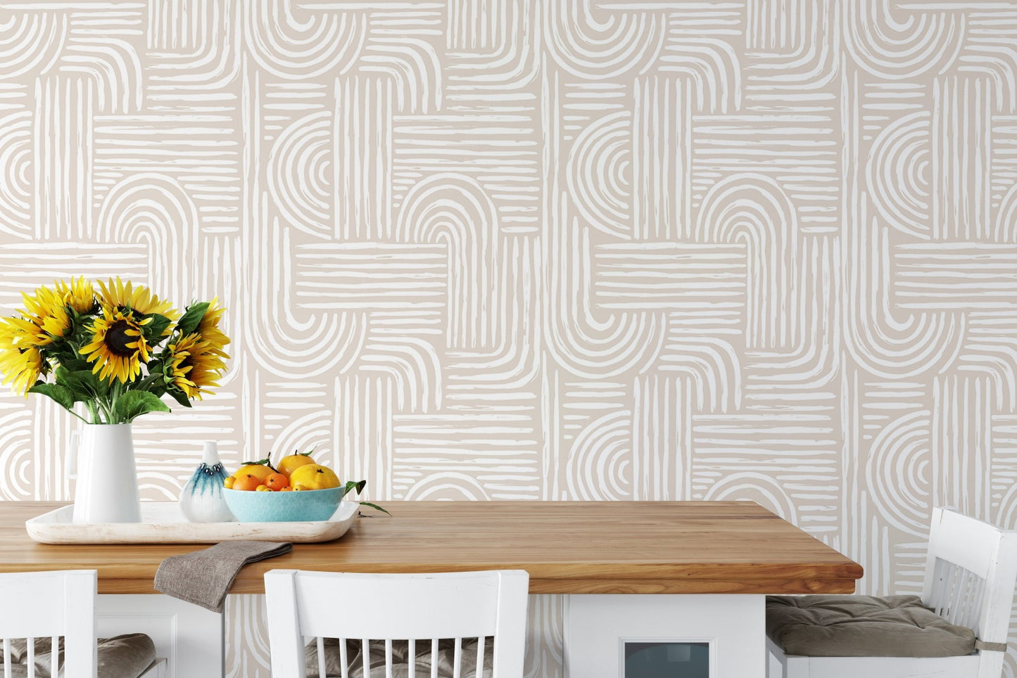 Dining area wallpaper with swell lines behind a wooden table and yellow flowers.