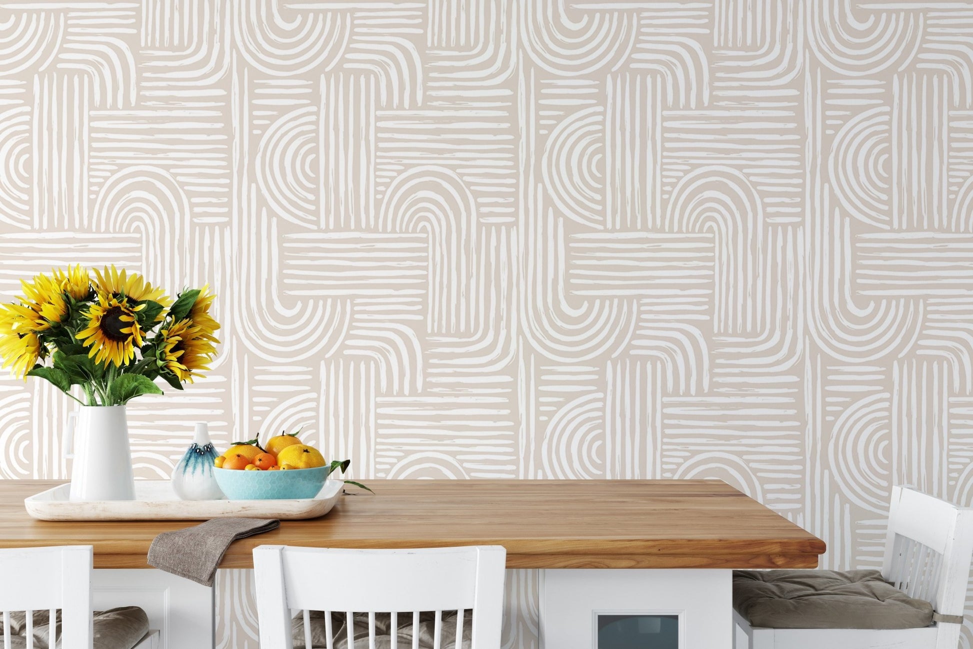 Dining area wallpaper with swell lines behind a wooden table and yellow flowers.