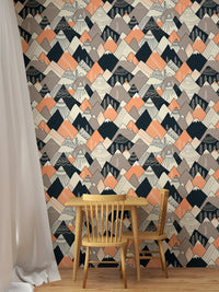 Grey and terracotta Scandinavian wallpaper in a small dining area.