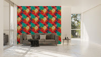 Red background floral wallpaper in a wide living room with a grey sofa.