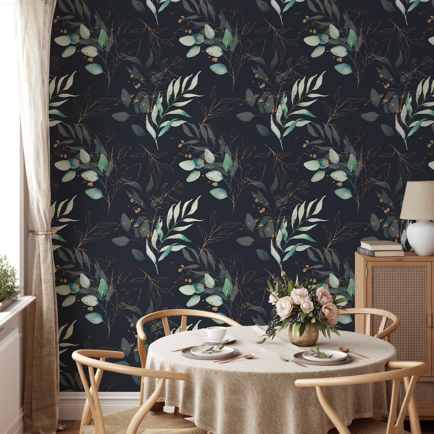 Botanical leaves wallpaper in a kitchen setting with a circular wooden dining table.