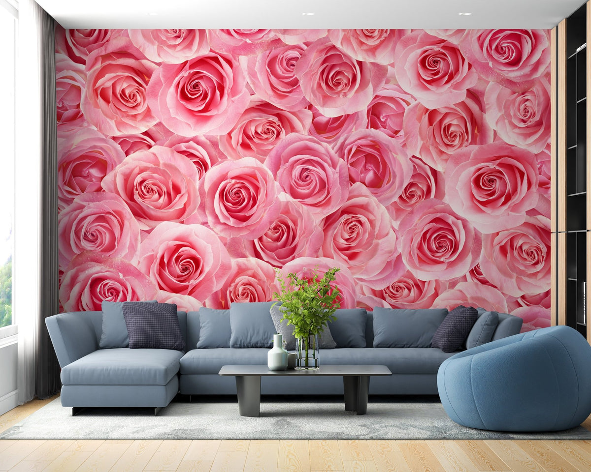 Spacious living room with a green sectional sofa and pink rose wallpaper.