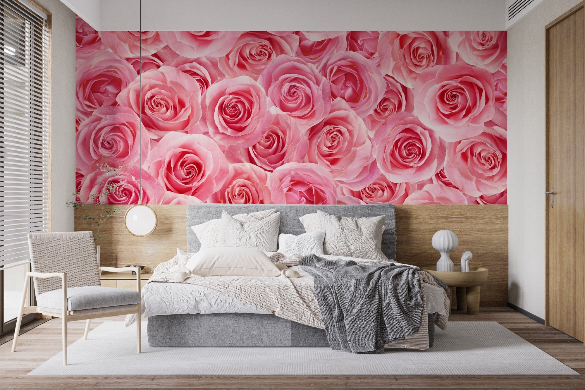 Charming Pink Rose wallpaper in a modern bedroom with a grey bed.