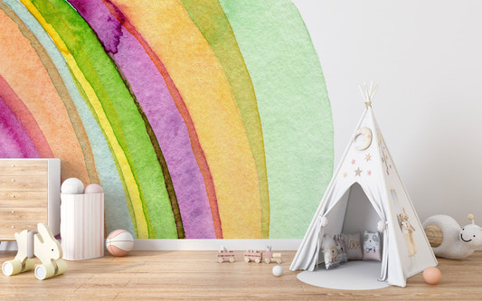 Watercolor strokes mural for nursery with teepee and wooden toys.
