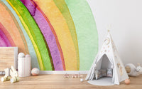 Watercolor strokes mural for nursery with teepee and wooden toys.
