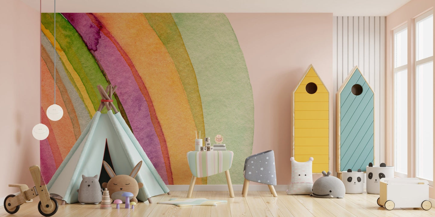 Large watercolor strokes mural behind indoor tent and play mats.