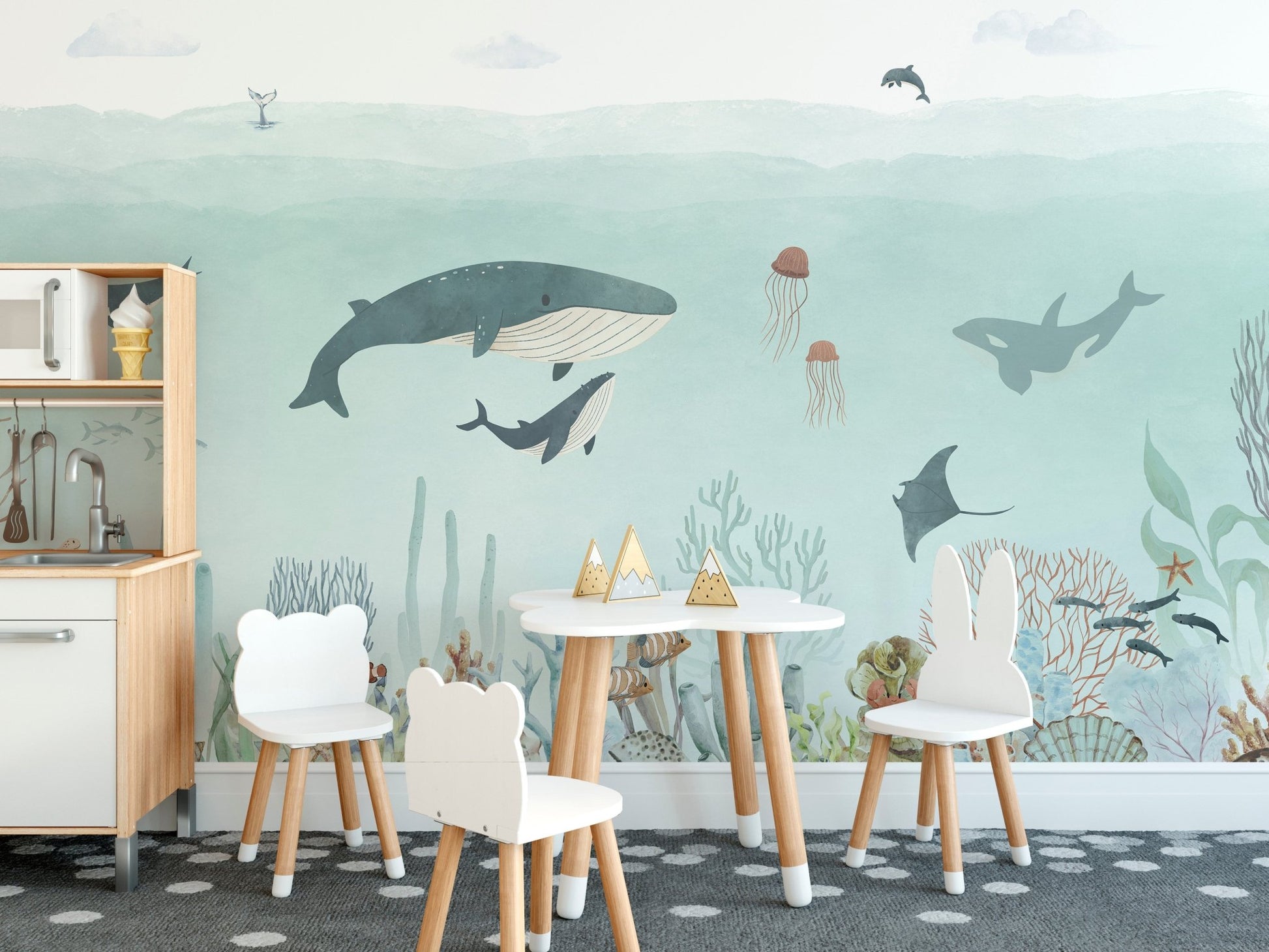 Sensational wall mural featuring dolphins and sea turtles in teal tones.