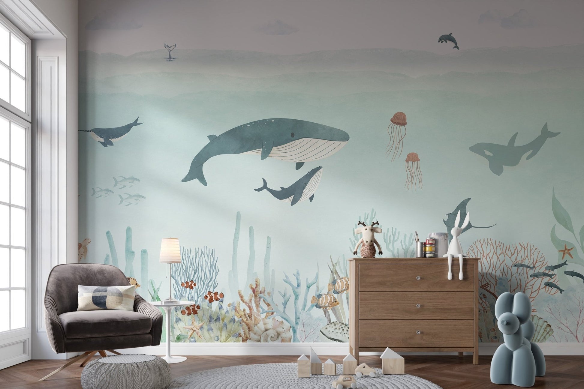 Soft blue sensational sea wallpaper mural with orca and stingray illustrations.