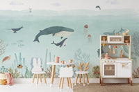 Sensational sea wallpaper mural with sea plants and anemones in soft hues.