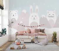 Dreamy mountain animals wall mural with snowy peaks and stars.